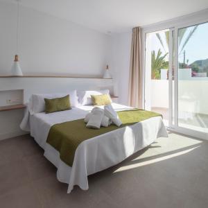 Postel nebo postele na pokoji v ubytování Hotel Senderos