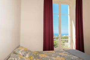 Кровать или кровати в номере Mont Boron Magnificent View-3 Rooms - Wifi - A.C
