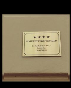 Certyfikat, podpis lub inny dokument wystawiony w obiekcie Apartment Luxury Nostalgia