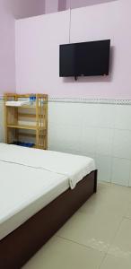 Säng eller sängar i ett rum på Hostel Garnet