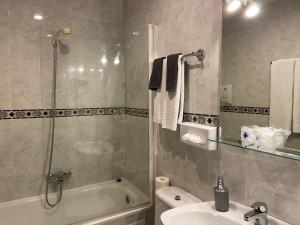 Koupelna v ubytování Hostal Concejo