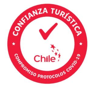 einem roten Kreis mit den Worten "columbiana tulsa tuberculosis clinic" in der Unterkunft Pichilemu Apart Hotel in Pichilemu