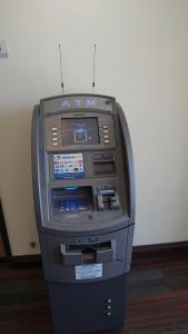 an atm machine is sitting on the floor at Holly Crest Hotel - Los Angeles, LAX Airport in Inglewood