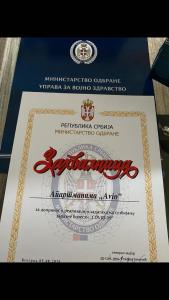 Avio Apartmani 2018 tesisinde sergilenen bir sertifika, ödül, işaret veya başka bir belge