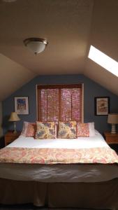 Ένα ή περισσότερα κρεβάτια σε δωμάτιο στο Guesthouse Cannon Beach