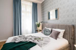 Posteľ alebo postele v izbe v ubytovaní Papillon Apartment - LoftAffair + 14 fotografií