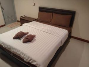 Postel nebo postele na pokoji v ubytování บ้านเล็ก รีสอร์ท + 22 fotografií