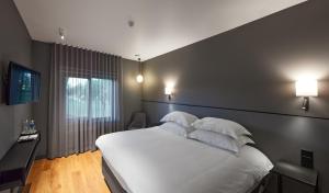 Postel nebo postele na pokoji v ubytování Zoltners Hotel + 32 fotografií