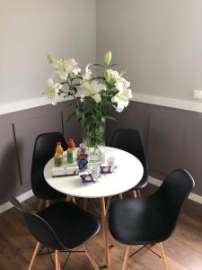 Nápoje v ubytovaní Apartament RESORT Chełmońskiego Śrem + 12 fotografií