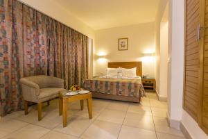 Postel nebo postele na pokoji v ubytování Hapi Hotel