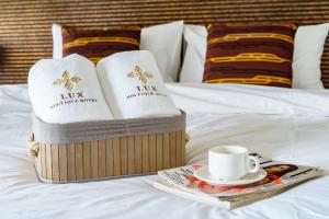 Postel nebo postele na pokoji v ubytování Lux Boutique Hotel