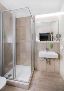 Łazienka w obiekcie JUFA Hotel Mariazell