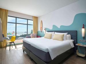 ibis Styles Vung Tau客房内的一张或多张床位
