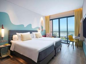 ibis Styles Vung Tau客房内的一张或多张床位