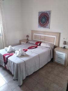 Cama o camas de una habitación en Apartamento Santonja a 300 metros de la playa