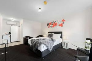 Comfort Inn Flinders on Main客房内的一张或多张床位