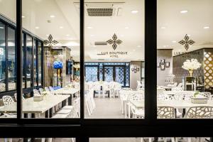 Restaurace v ubytování Lux Boutique Hotel + 20 fotografií