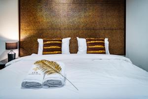 Postel nebo postele na pokoji v ubytování Lux Boutique Hotel