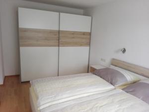 Postel nebo postele na pokoji v ubytování Haus Annette