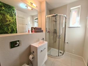 Ένα μπάνιο στο Lux Apartment Cosy +9 φωτογραφίες