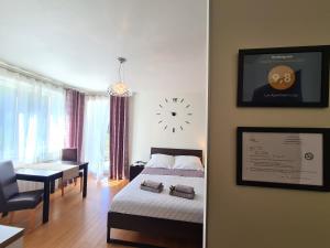 Ένα ή περισσότερα κρεβάτια σε δωμάτιο στο Lux Apartment Cosy