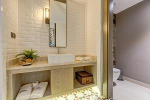 Ванная комната в Melanippe Relaxing Hotel -Adults Only