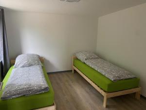 En eller flere senge i et værelse på Großer Vampir