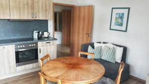 Η κουζίνα ή μικρή κουζίνα στο Komfort Appartement Panoramaweg +5 φωτογραφίες