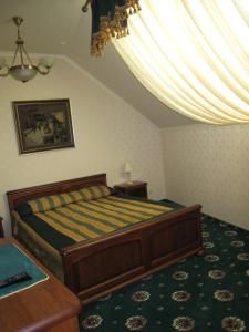 Postel nebo postele na pokoji v ubytování Atrium Hotel