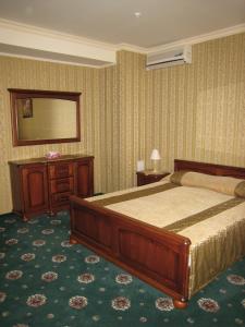 Postel nebo postele na pokoji v ubytování Atrium Hotel