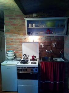 Η κουζίνα ή μικρή κουζίνα στο ÖregFenyő Porta Őrség-Magyarszombatfa
