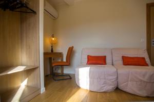 Postel nebo postele na pokoji v ubytování Hotel Cesario