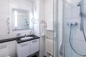 Koupelna v ubytování Hotel Coop Tagungszentrum & Hotelpark im Grünen