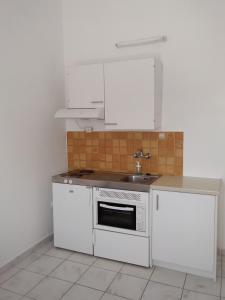 Kuchyň nebo kuchyňský kout v ubytování Gorgona apartments & studios