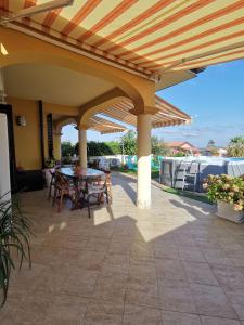 Patio nebo venkovní prostory v ubytování Casa Vacanze Villa Mimosa- per le vacanze vicino a Tropea