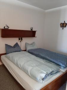 Postel nebo postele na pokoji v ubytování Haus Marmotta + 34 fotografií