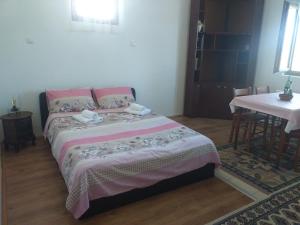 Postel nebo postele na pokoji v ubytování Apartman Milica