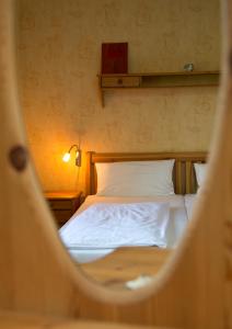 Ein Bett oder Betten in einem Zimmer der Unterkunft Ferienhaus Zur Schmiede