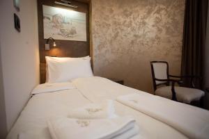 Voodi või voodid majutusasutuse Hotel Vrbak ND toas