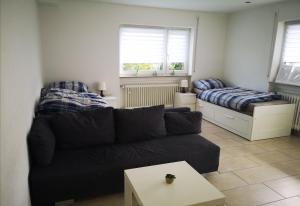 Posezení v ubytování Ferienwohnung im Grünen