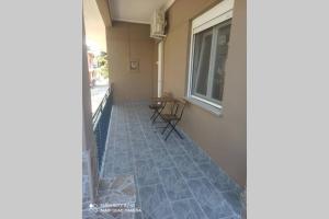 Balkón alebo terasa v ubytovaní Άνετη διαμονή στο κέντρο της Ανατολής