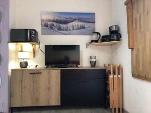 O bucătărie sau chicinetă la Studio 3 personnes idéalement situé, au pied des pistes et proche commerces