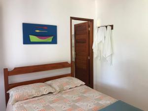 Postel nebo postele na pokoji v ubytování Pouso Familiar - Cantinho das Águas
