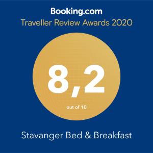 a yellow circle with the number eight and the text travelling review awards at Stavanger Bed & Breakfast in Stavanger