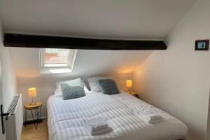 מיטה או מיטות בחדר ב-Authentic Stays - 4p-apartment