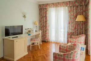 TV a/nebo společenská místnost v ubytování Hotel Miramar