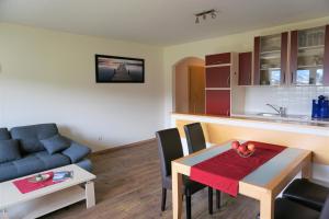 A kitchen or kitchenette at Aparthotel Sunrise