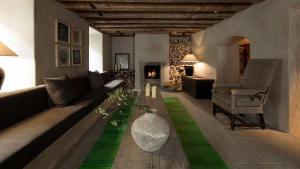 Posezení v ubytování Townhouse Weisses Kreuz Boutiquehotel