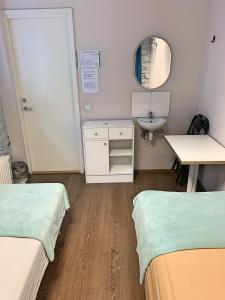 Postel nebo postele na pokoji v ubytování Süda Hostel