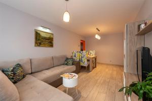 Svetainės erdvė apgyvendinimo įstaigoje Apartament LILA